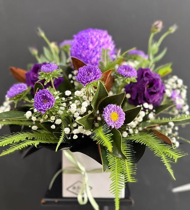 Purple floral arrangement in a white box, featuring purple blooms and green foliage — J'adore Flowers & Gifts Cairns in Earlville, QLD