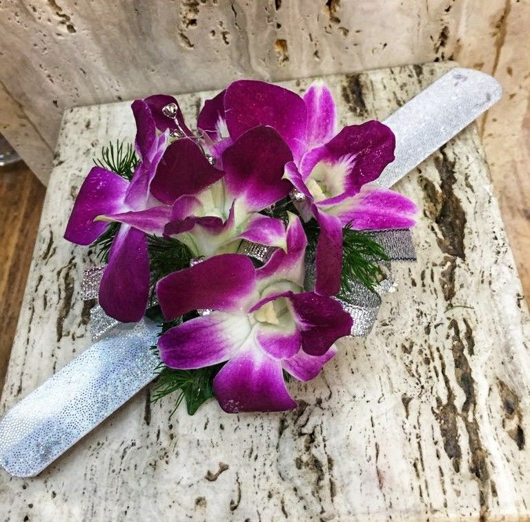 Wrist Corsage of Purple and White Orchids With Silver Ribbon — J'adore Flowers & Gifts Cairns in Stratford, VIC