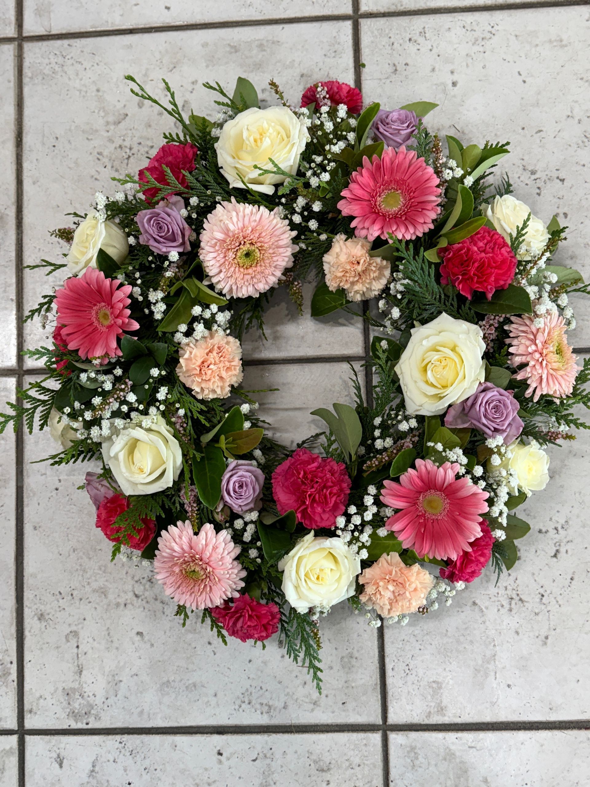 Floral Wreath With Pink, Red, and Cream-colored Blooms and Greenery โ J'adore Flowers & Gifts Cairns in Earlville, QLD