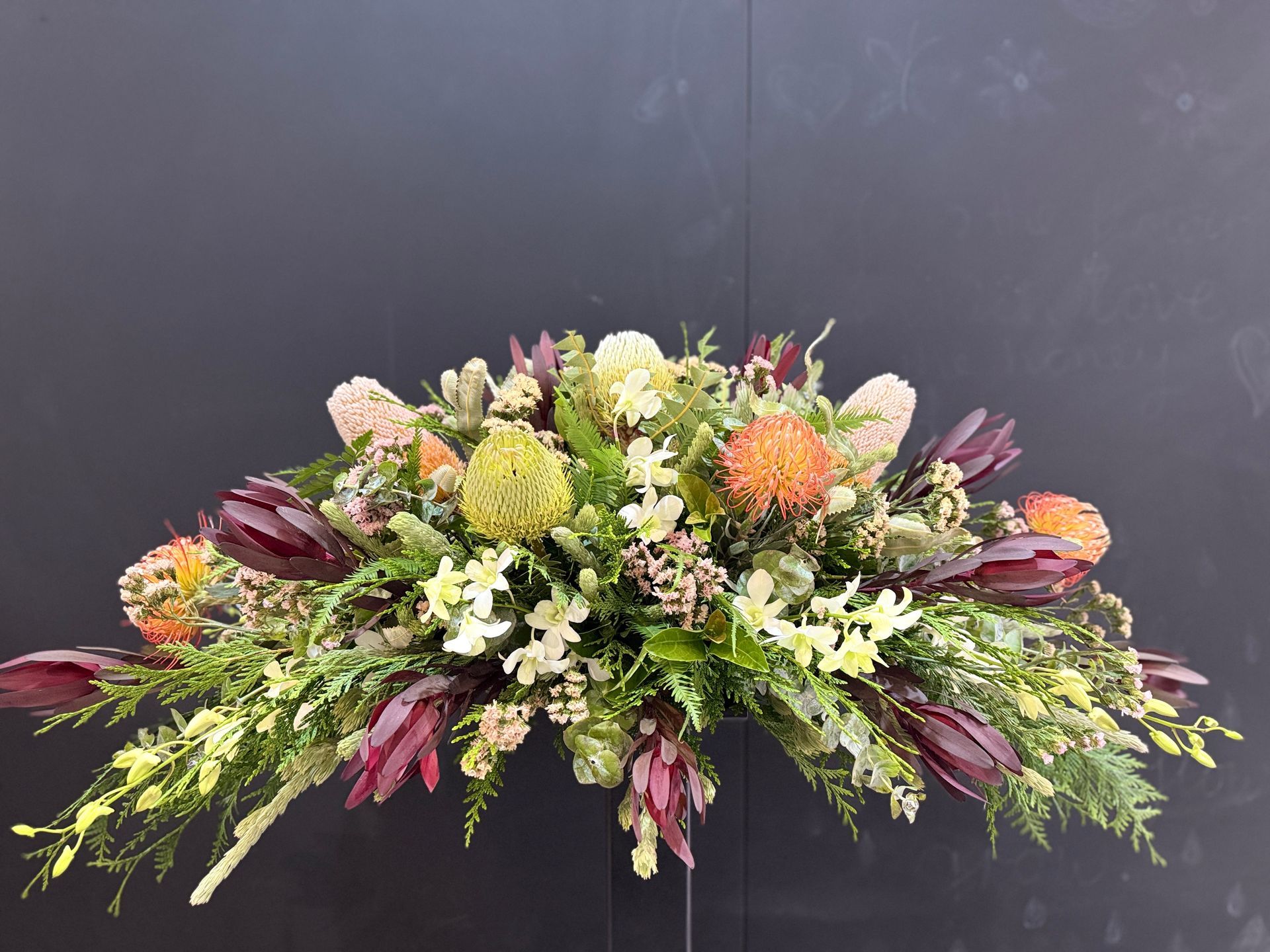 Floral Arrangement With Orange, Cream, and Burgundy Flowers โ J'adore Flowers & Gifts Cairns in Earlville, QLD