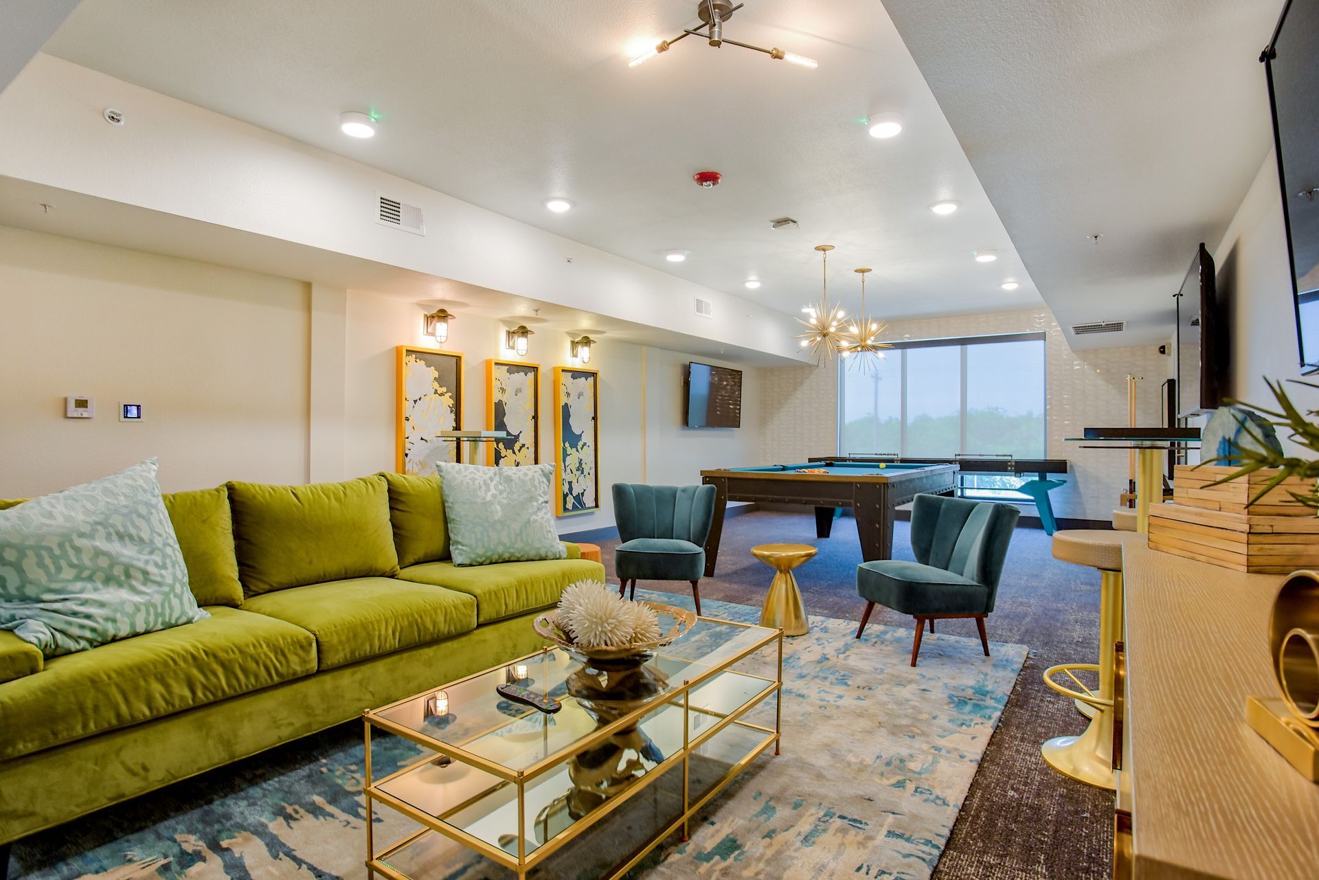 Club Room with a billiards table and lounge area at Three77 Park in Fort Worth, TX.
