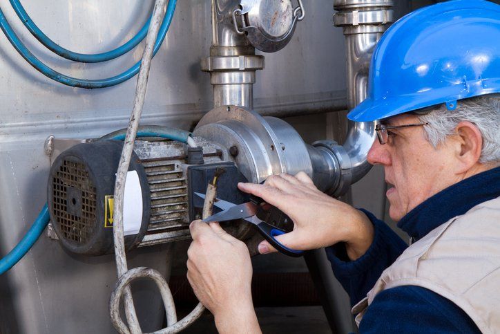 Repairman at maintenance work