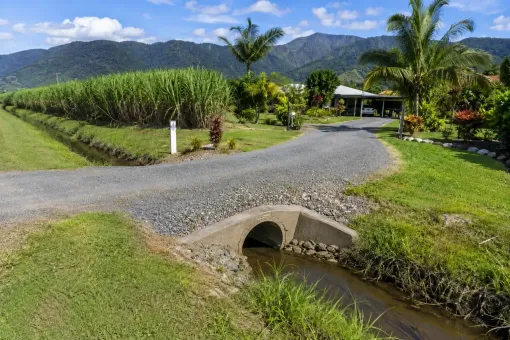 Culvert to stop gravel driveway flooding near Fishery Falls south of Cairns