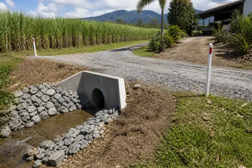 Culvert to stop gravel driveway flooding near Fishery Falls south of Cairns