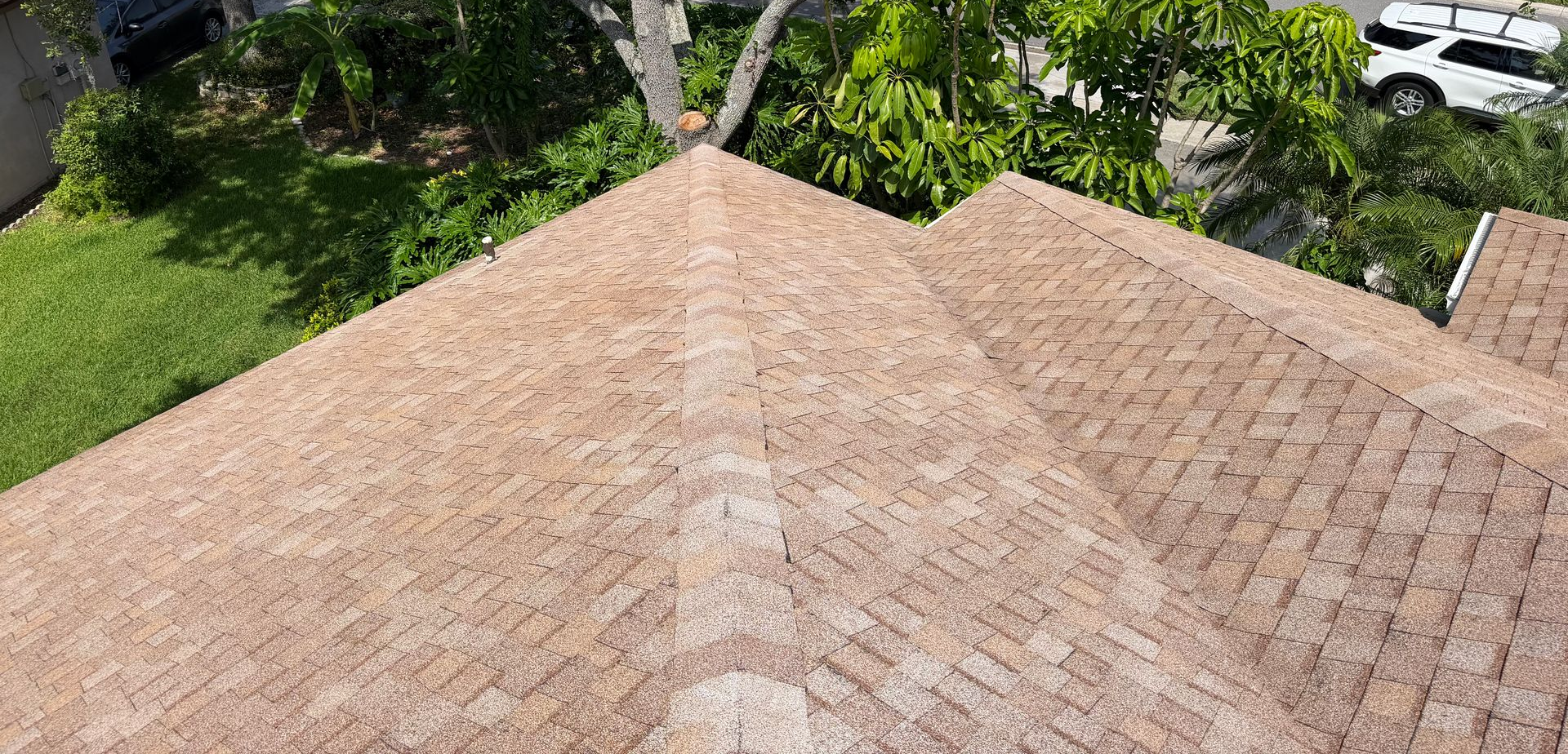 Bringing a roof back to life. Soft wash roof cleaning in Lutz removes algae and stains! Call us today for a free quote now!