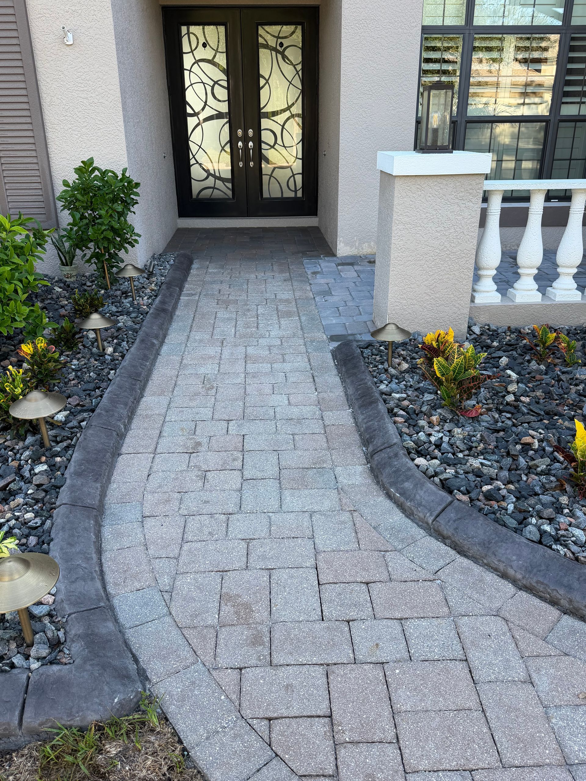 Paver patio restored through professional paver cleaning and sealing in Tampa Bay, close-up view
