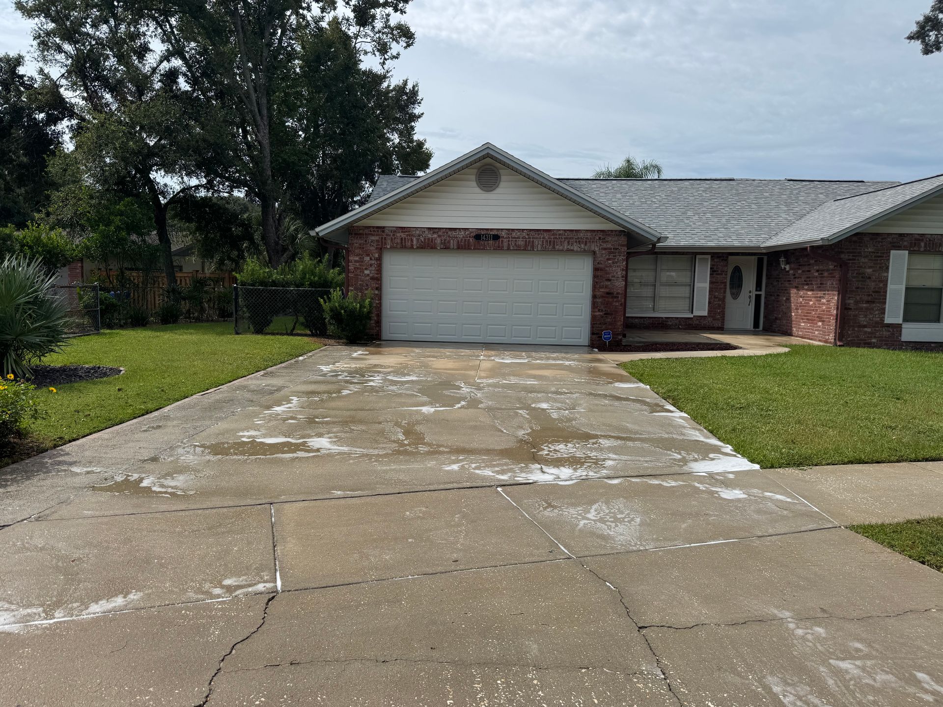 Pressure washing services in North Pointe driveways, sidewalks & siding cleaned by Wild West Washing. Free quotes available!
