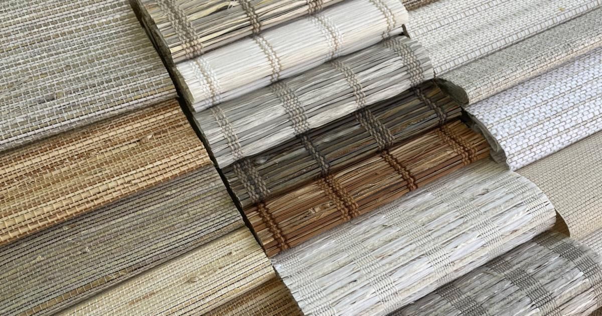 A bunch of different types of fabrics are stacked on top of each other.