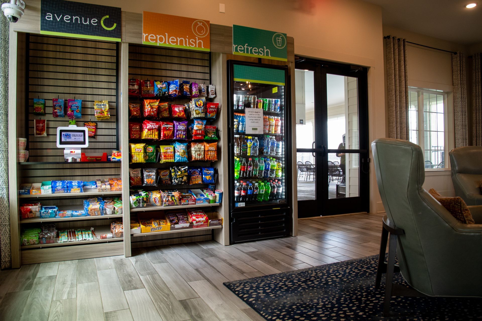 Convenience store-style shelves stocked with snacks and drinks.