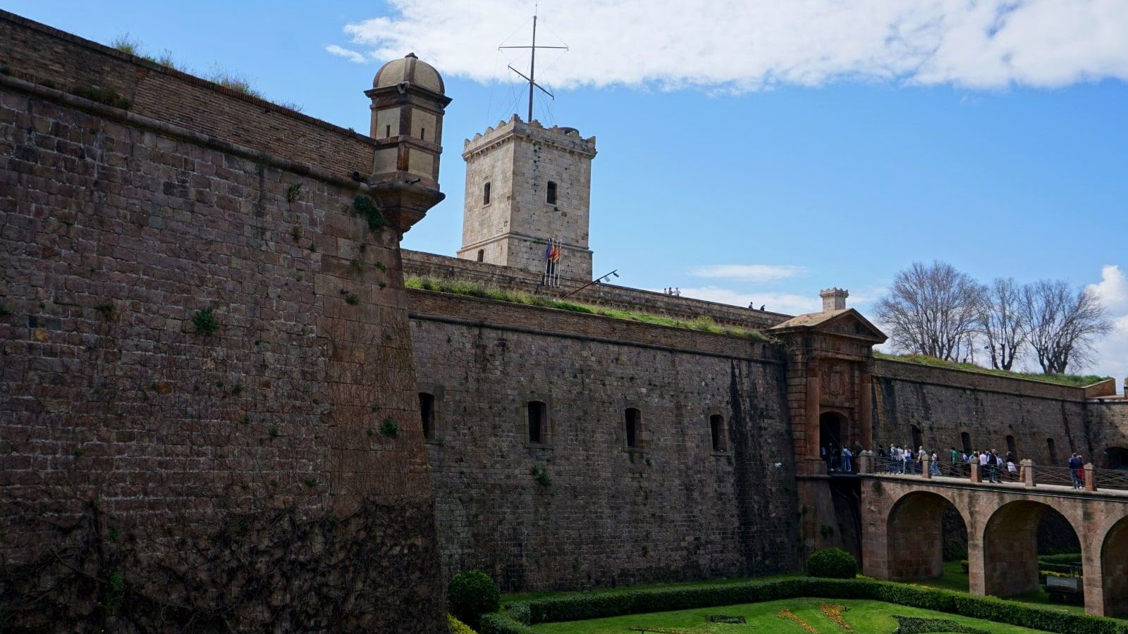A brick building with a tower on top of it
