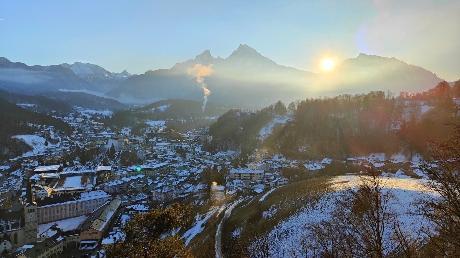 Berchtesgaden Watzmann The sun is shining through the clouds over the mountains