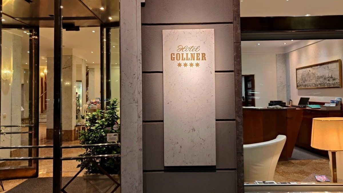 Hotel Gollner Graz A building with a sign that says ' sollana ' on it