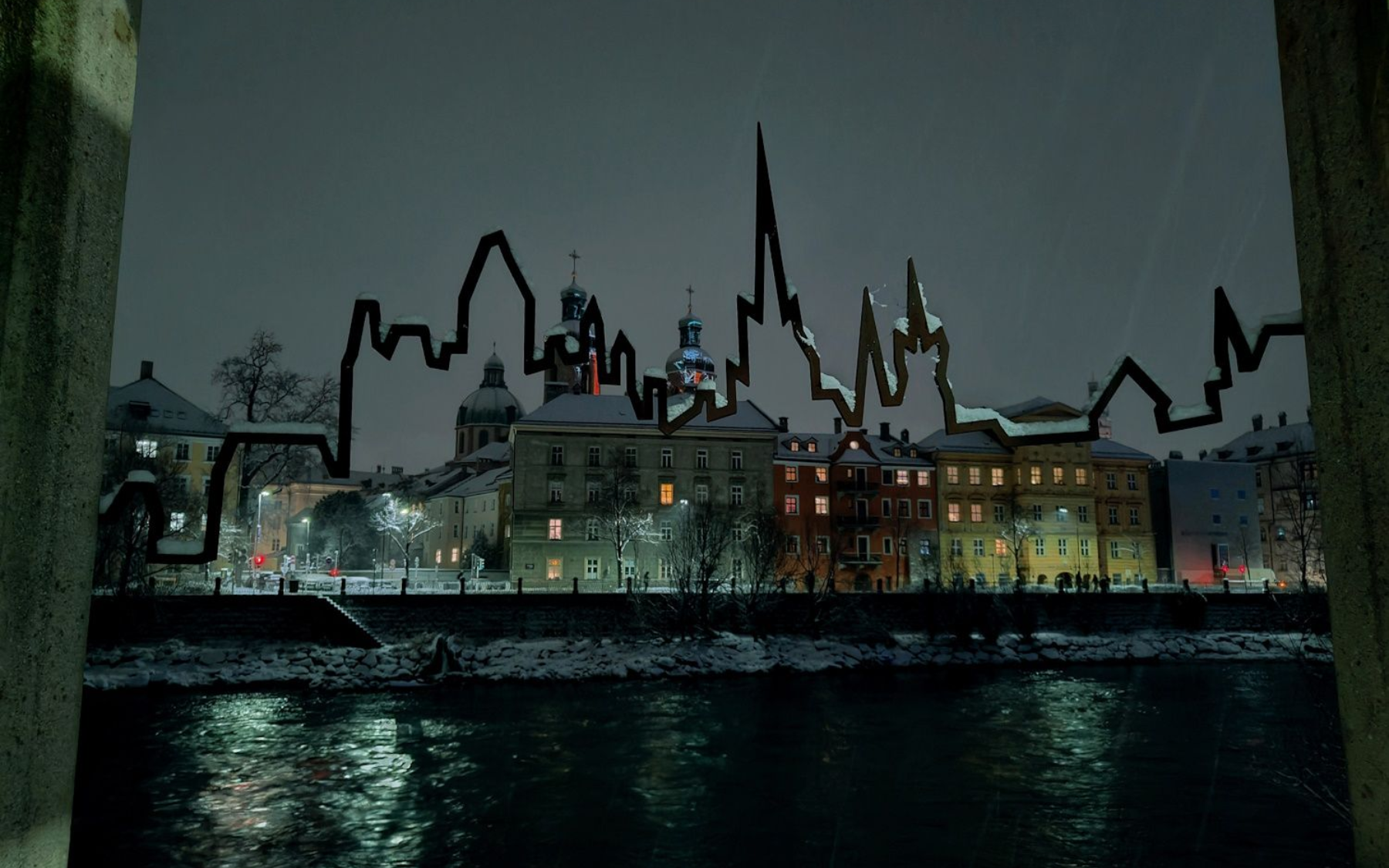 Innsbruck bei Nacht Night view of a snow-covered city skyline with pixelated overlay, buildings reflect in the dark river below.