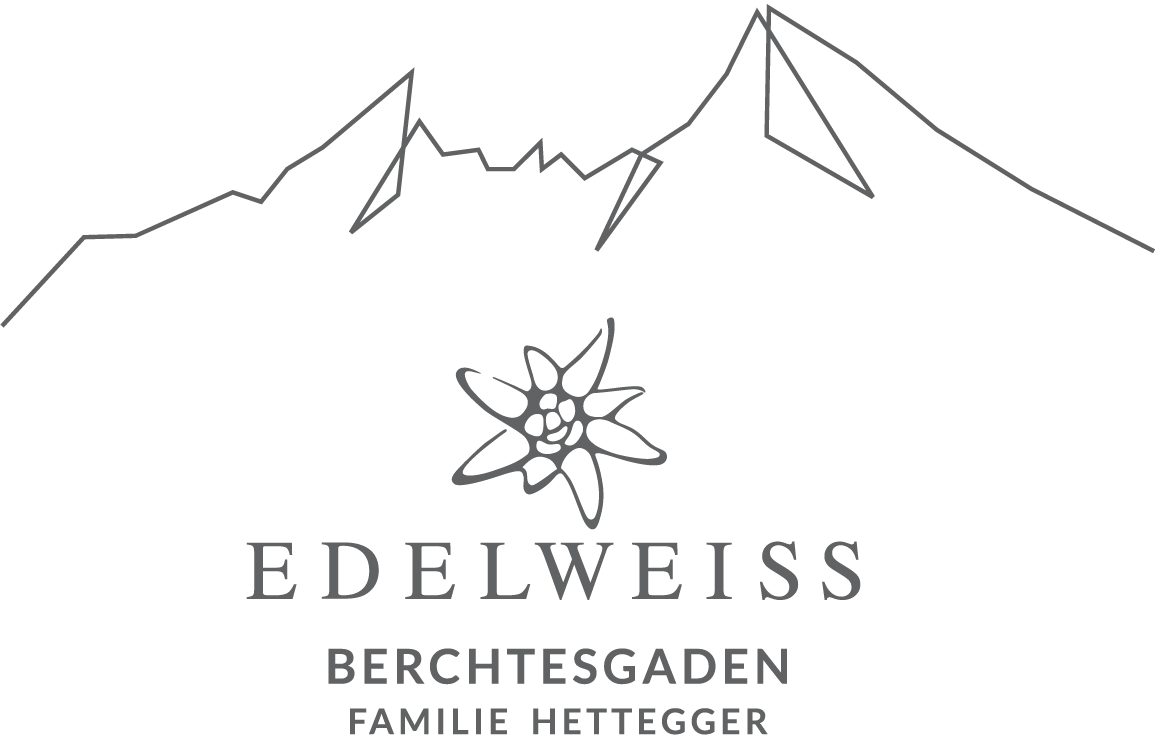 Ein Logo für Edelweiss Berchtesgaden mit einem Berg und einer Blume.