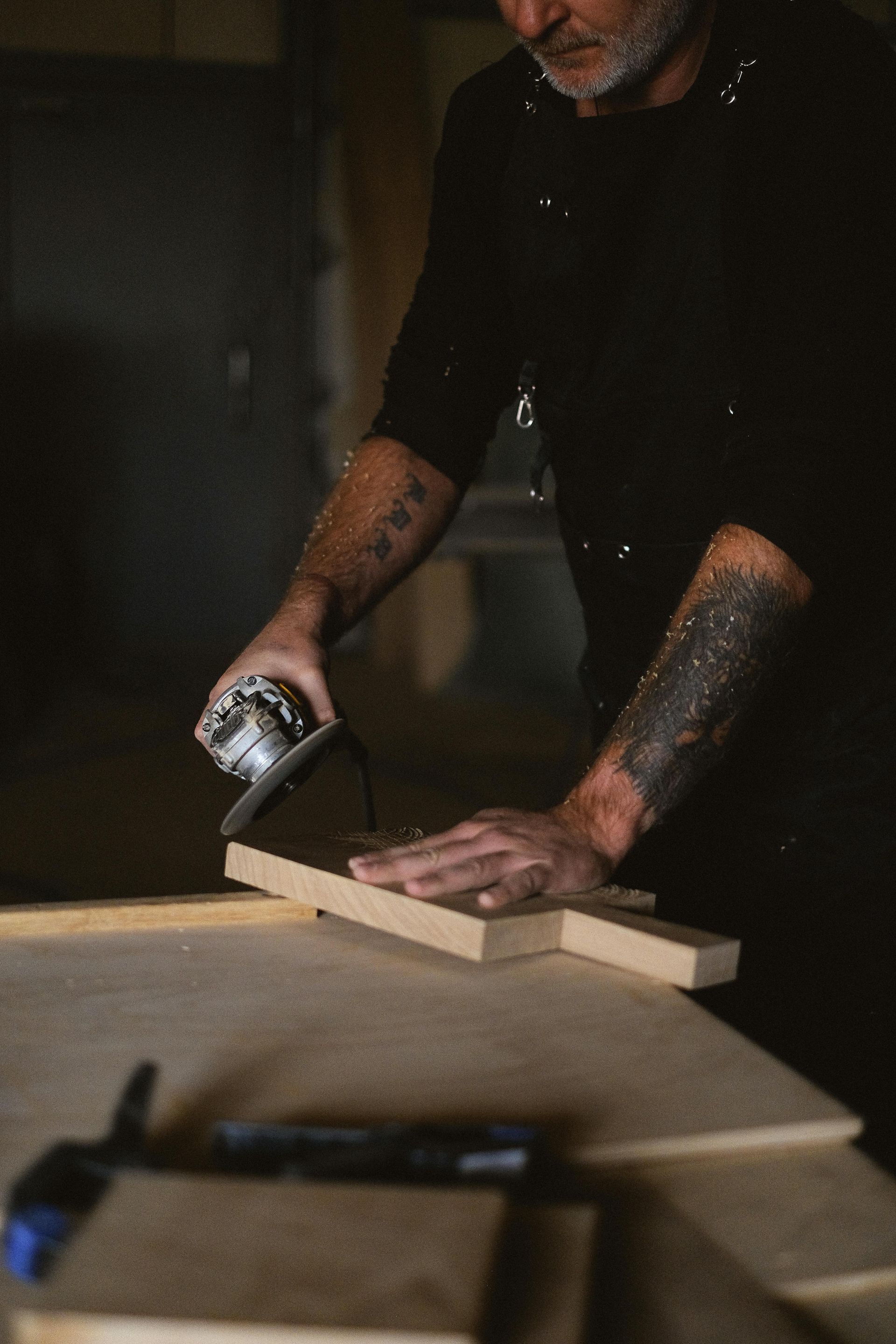 Some using a circular saw on wood