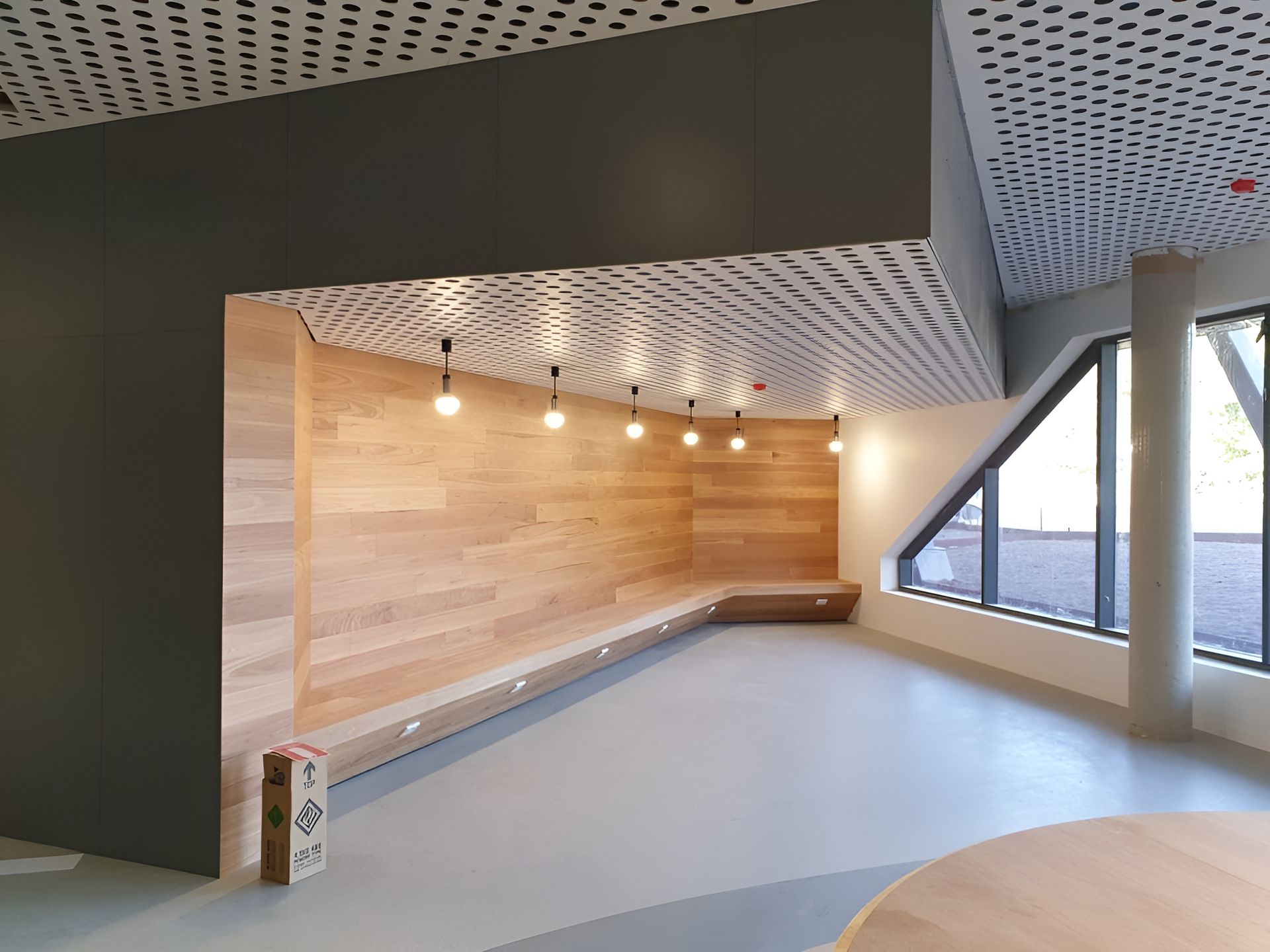 A Room With A Wooden Wall And A Table In It — Waltlec Industries In Garbutt, QLD