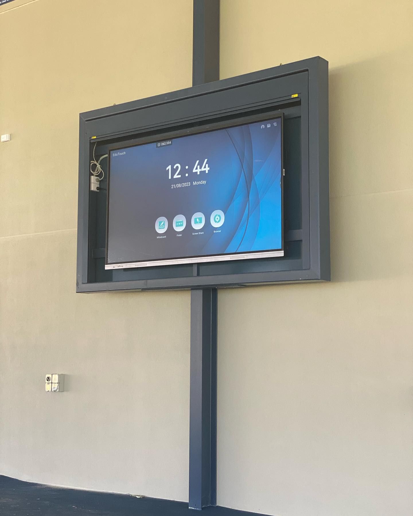 A Large Flat Screen Tv Is Mounted On A Wall — Waltlec Industries In Garbutt, QLD