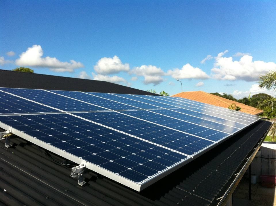A Row Of Solar Panels On The Roof Of A House — Waltlec Industries In Garbutt, QLD