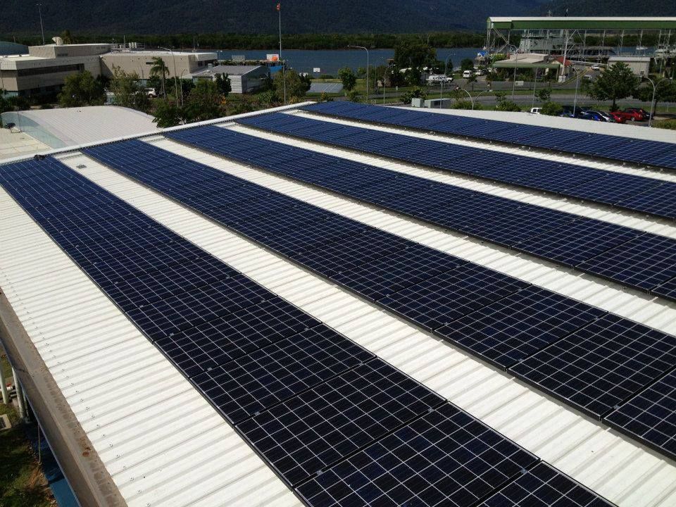 Rows Of Solar Panels On The Roof Of A Building — Waltlec Industries In Garbutt, QLD