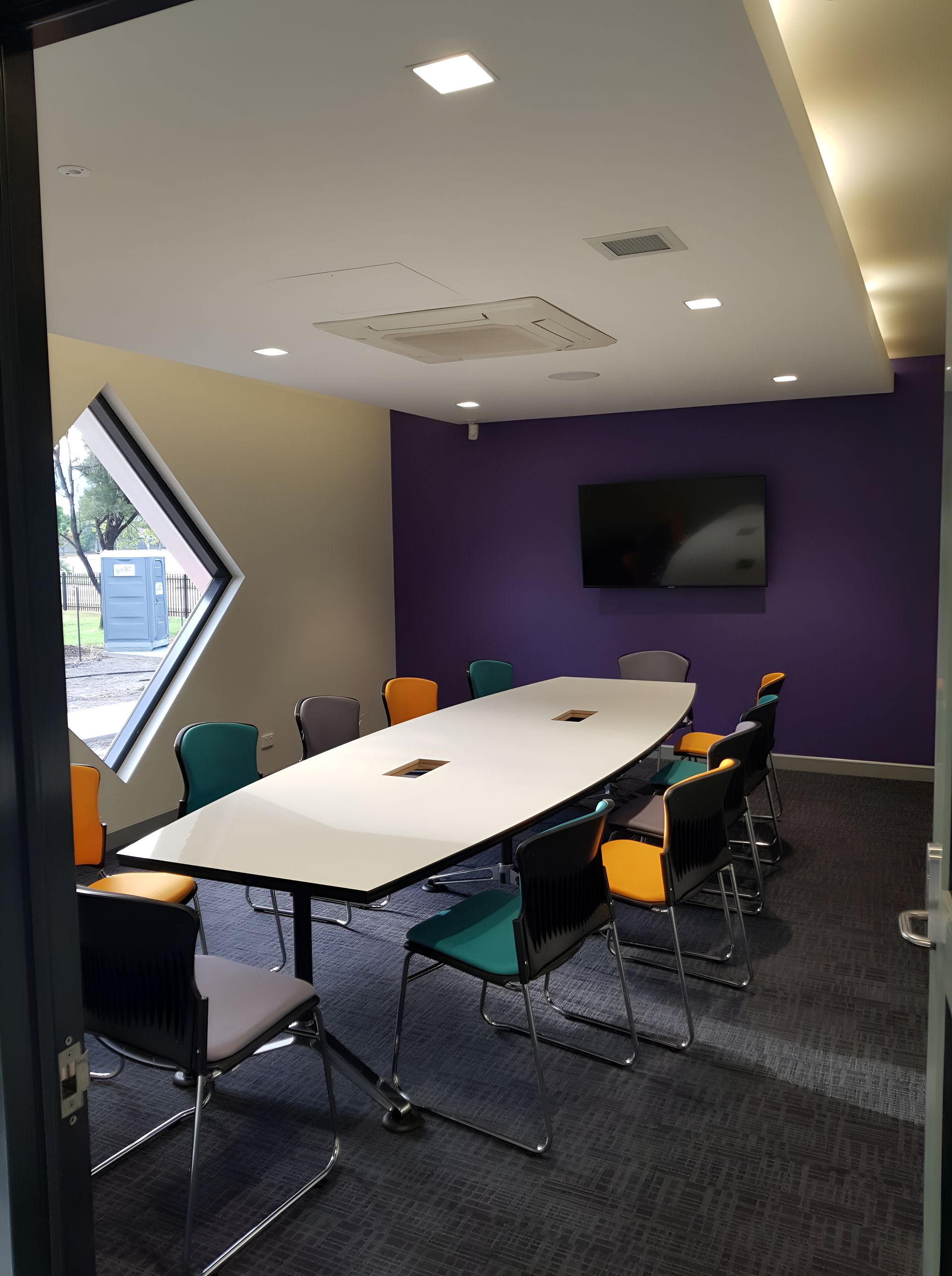 A Conference Room With A Long Table And Chairs — Waltlec Industries In Garbutt, QLD