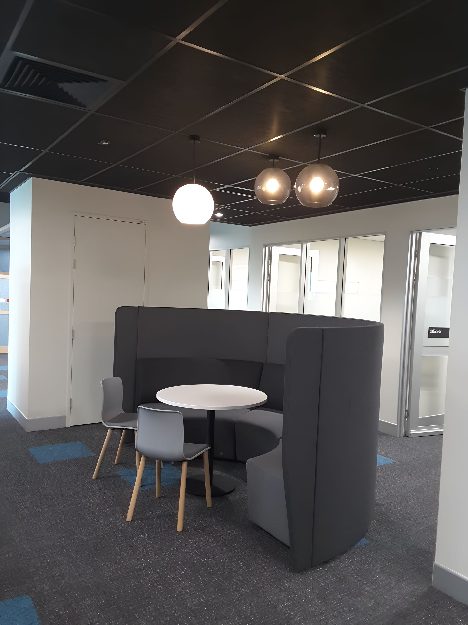 A Booth With A Table And Chairs In A Room — Waltlec Industries In Garbutt, QLD