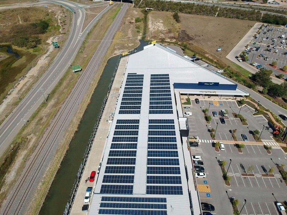 An Aerial View Of A Building With Solar Panels On The Roof — Waltlec Industries In Garbutt, QLD