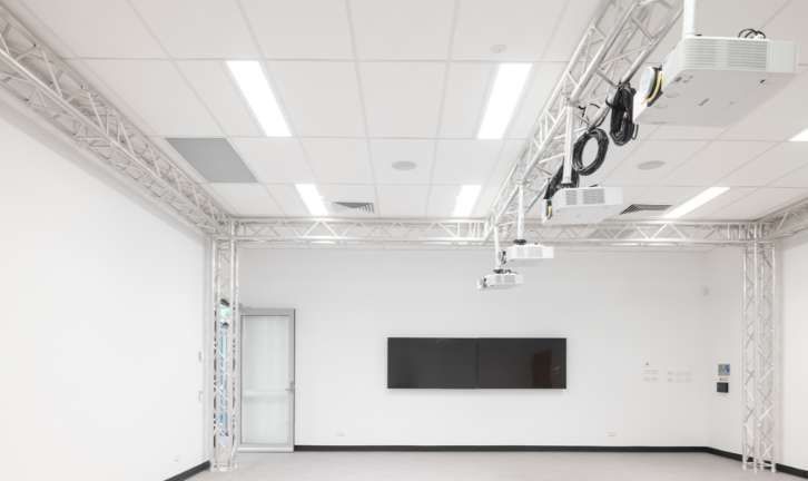 An Empty Room with A Projector on The Ceiling and A Blackboard on The Wall — Waltlec Industries In Garbutt, QLD