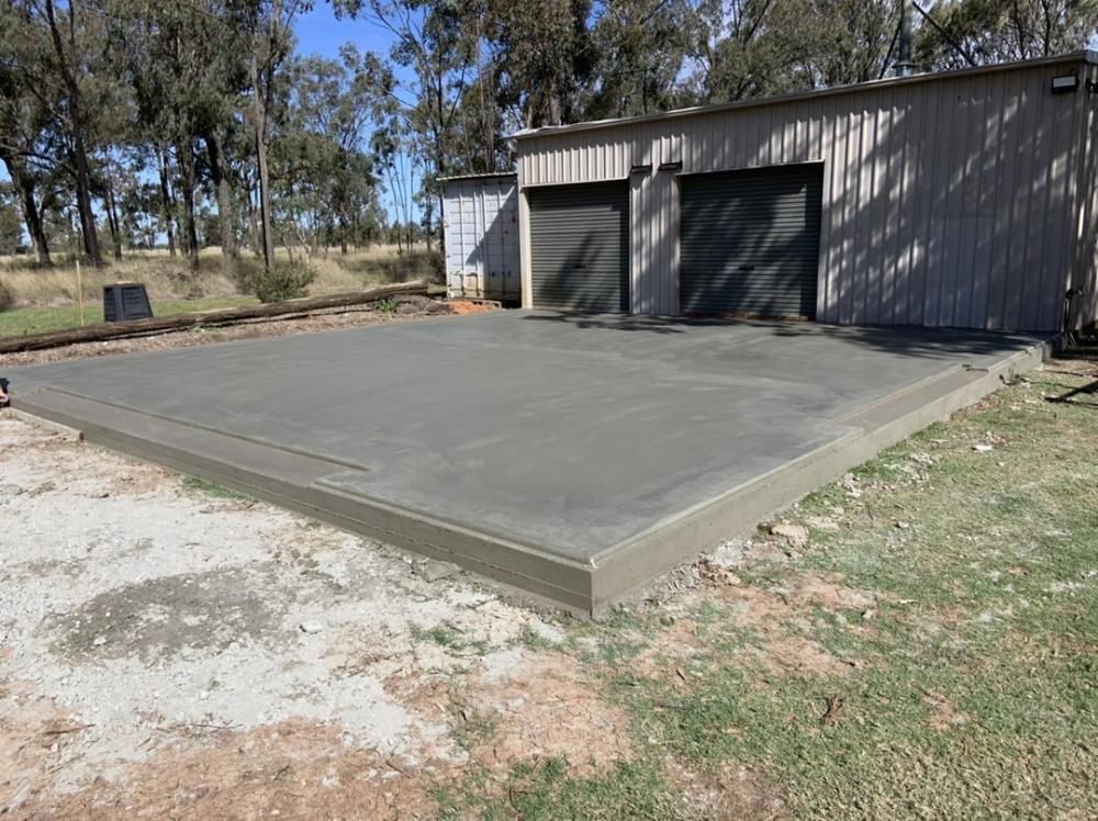 New Concrete Slab In Front of a Garage — Pedro's Concreting in Pittsworth, QLD