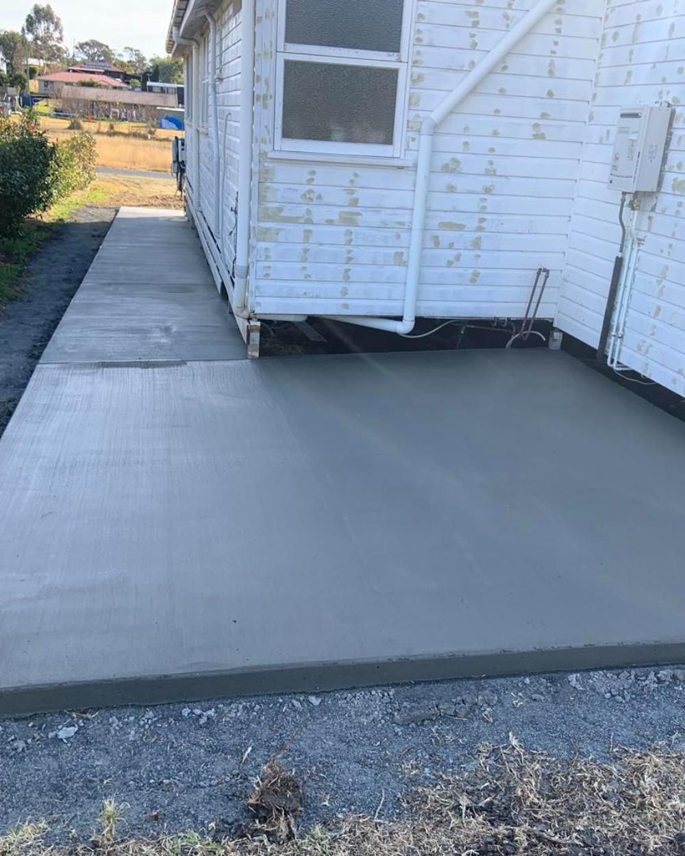 Concrete Walkway is Being Built in Front of a House — Pedro's Concreting in Warwick, QLD