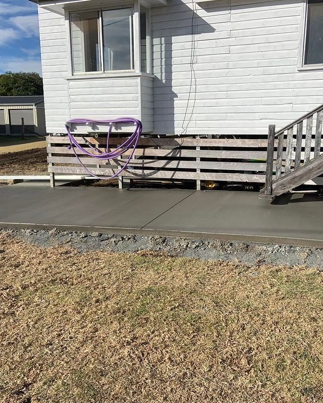 A White House With a Concrete Walkway and Stairs — Pedro's Concreting in Pittsworth, QLD