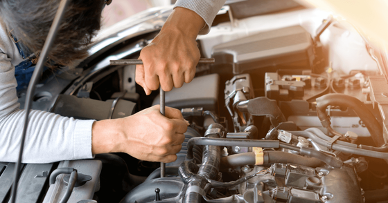 a mechanic changing a part