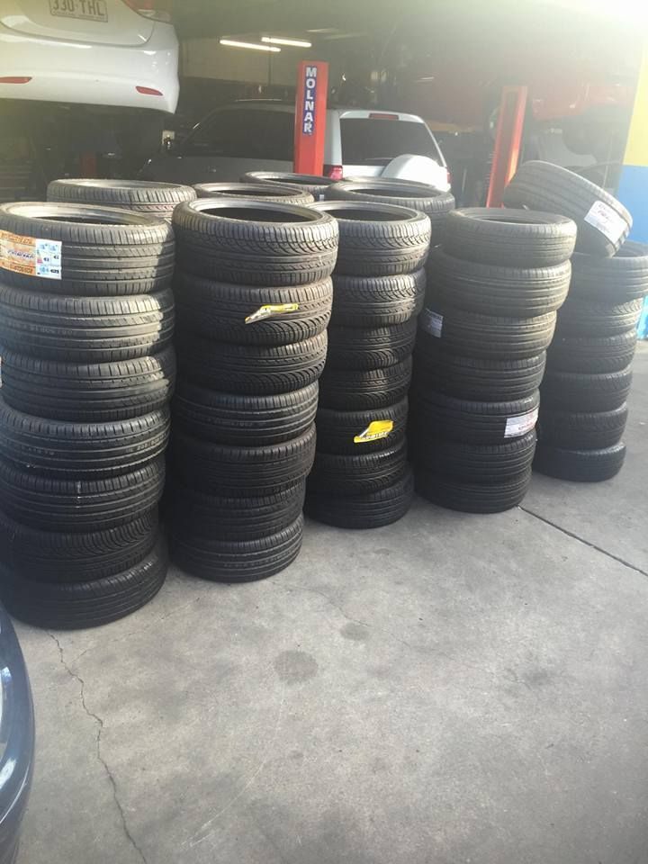Lot of Tires Are Stacked on Top of Each Other — Kirra Mechanical in Coolangatta, QLD