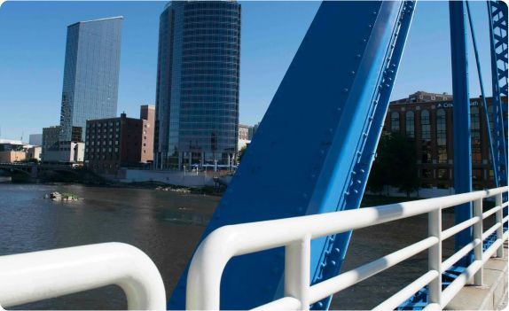 A blue bridge over the Grand River in Grand Rapids, Michigan.