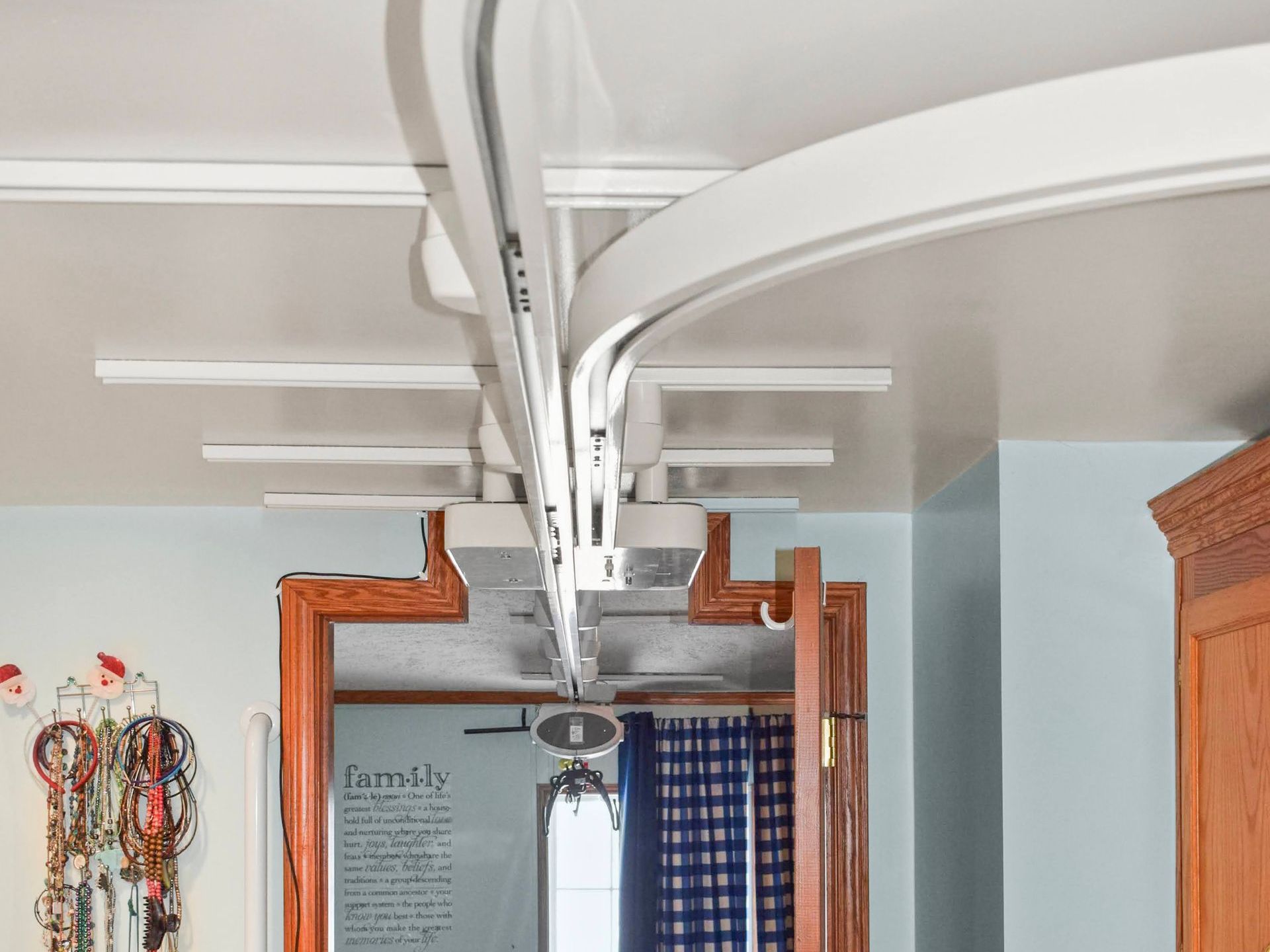 A ceiling lift going from one room to the next.