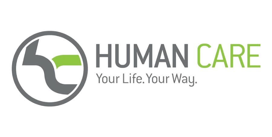 Human Care logo: Gray and green design in a circle with text