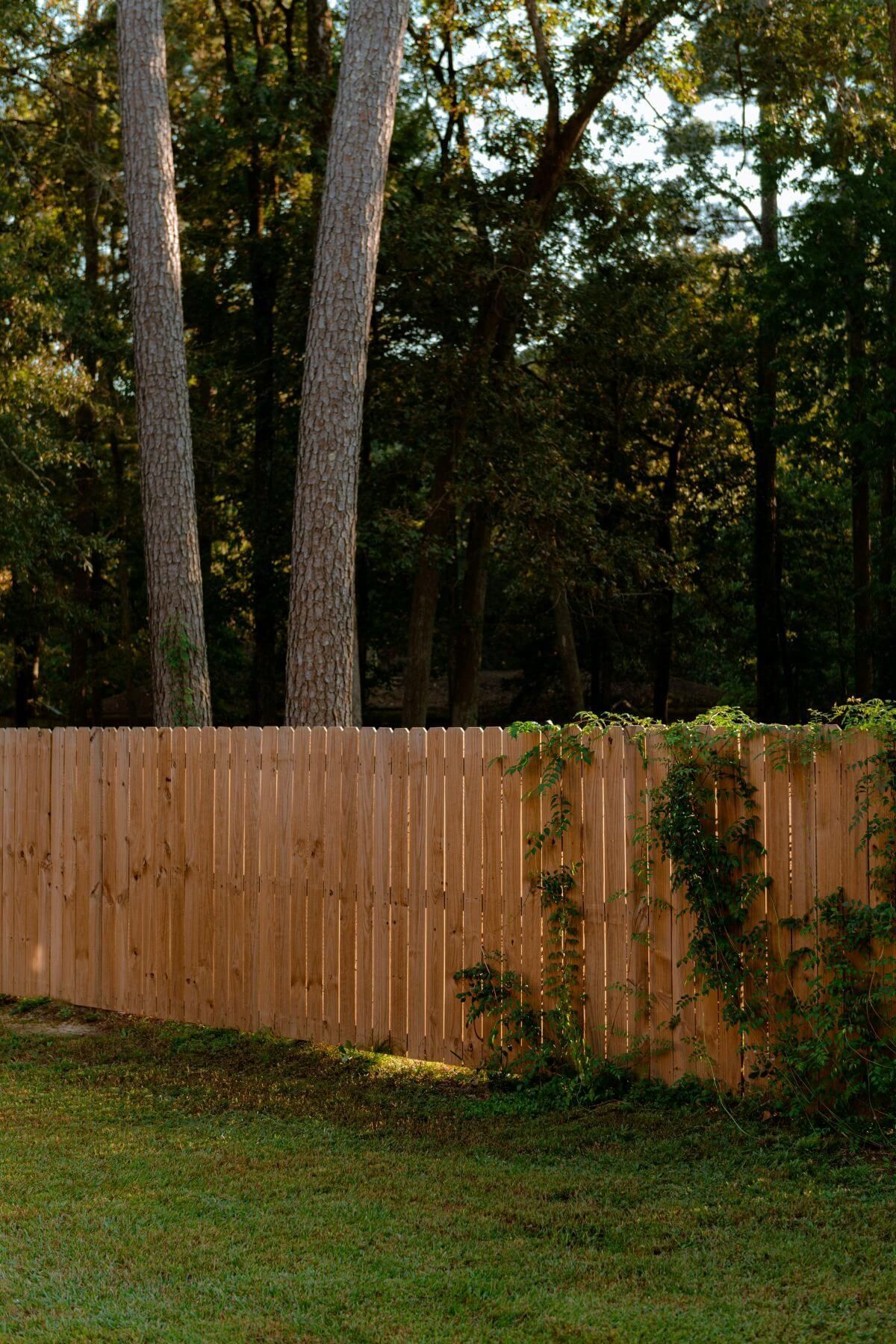 Fence crew installing privacy fence posts in San Angelo