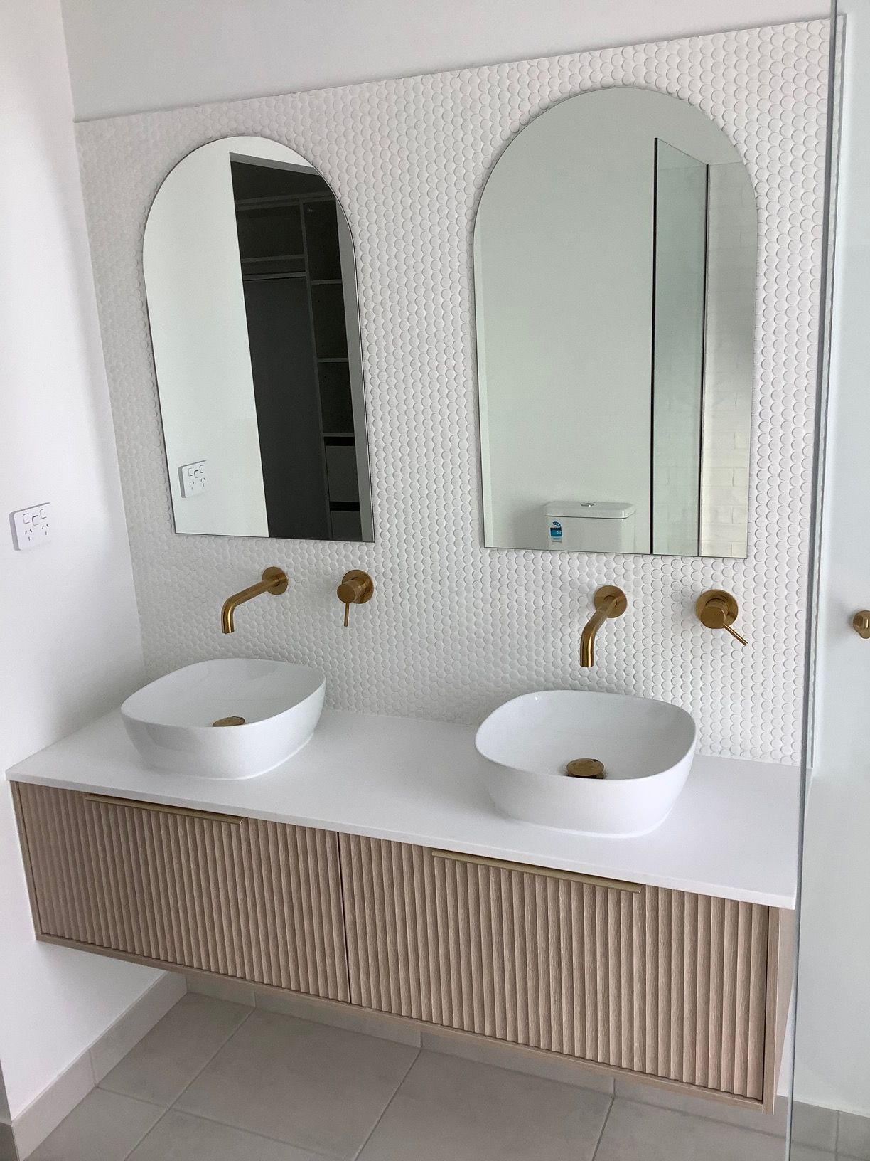 A Bathroom With Two Sinks And Two Mirrors — Darryl Tickle Building Pty Ltd In Alice River, QLD