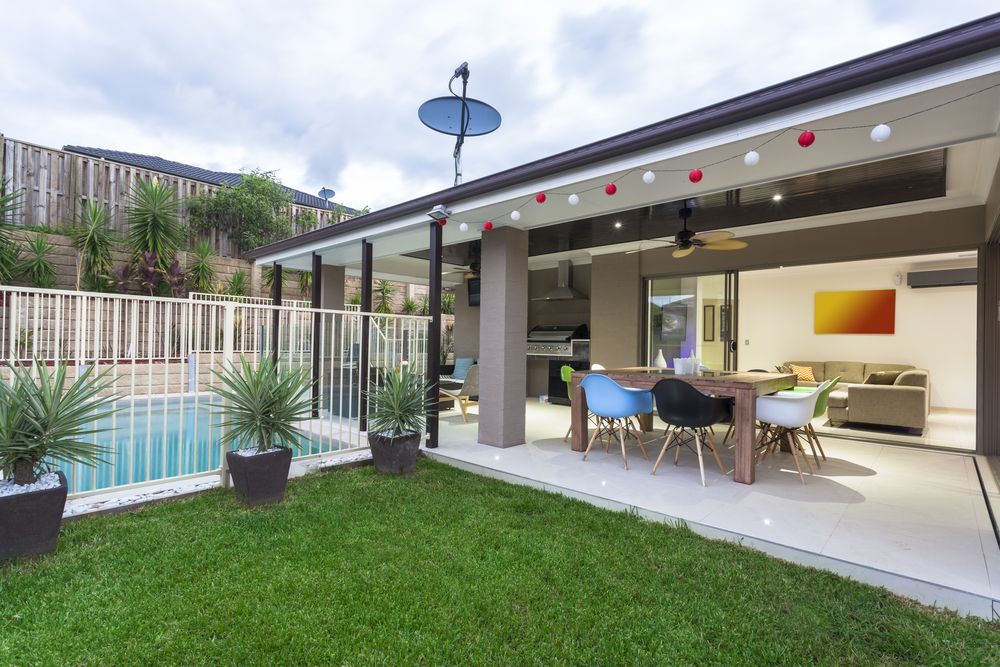 An Outdoor Pool And Patio— Darryl Tickle Building Pty Ltd In Alice River, QLD