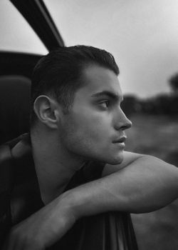 Profile of a man with a defined jawline in natural daylight