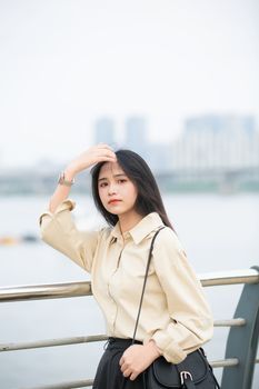 Young woman smiling outdoors in Seoul