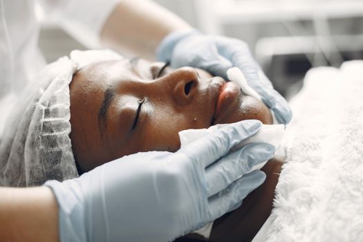 Woman relaxing during a hydrating facial treatment