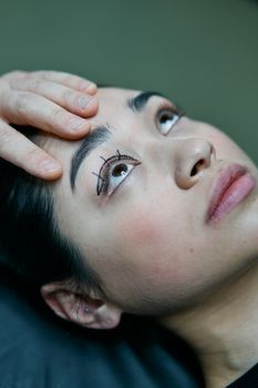 Close-up of the under-eye area of a woman during a skin consultation