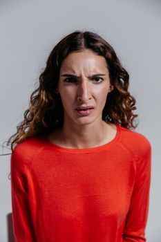 Woman with raised eyebrows showing horizontal forehead lines