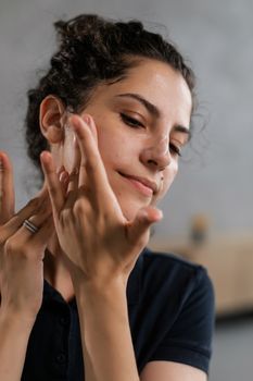 Close-up of smooth, hydrated cheek skin in soft morning light