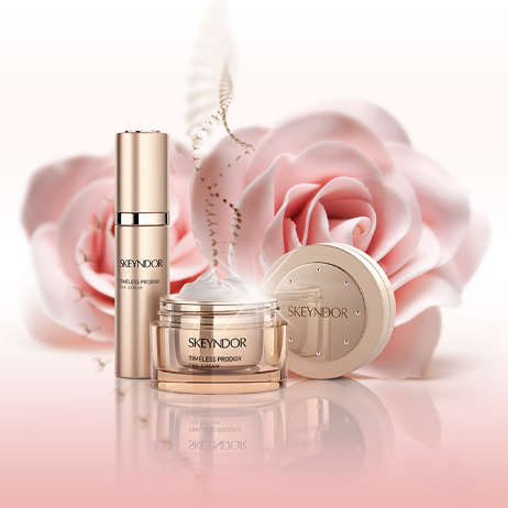 Kit Linea Timeless Prodigy junto a una rosa rosa