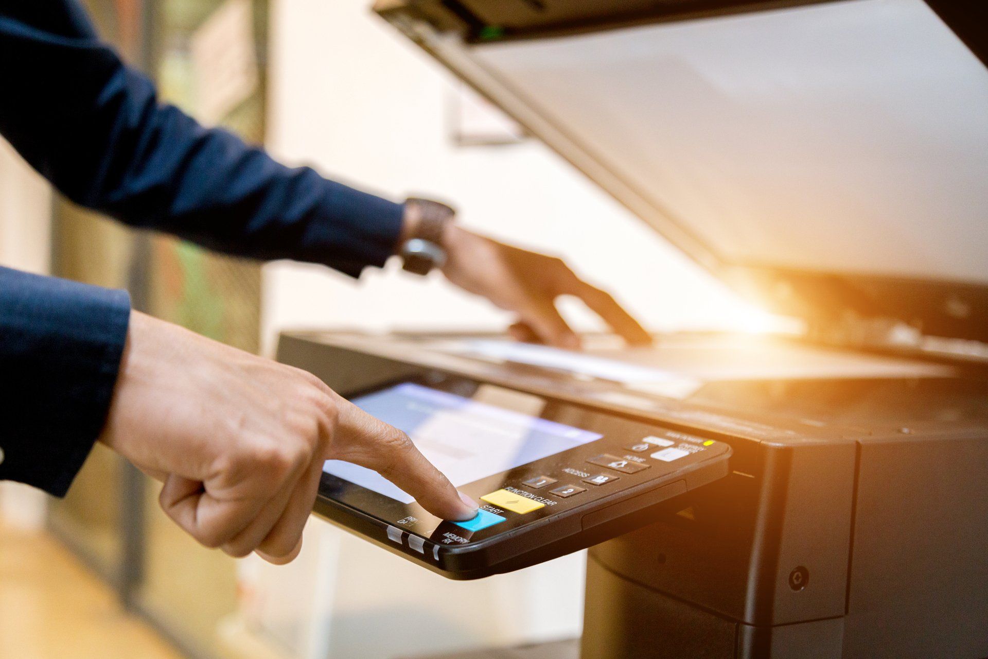 Bussiness man Hand press button on panel of printer, printer scanner laser office copy machine