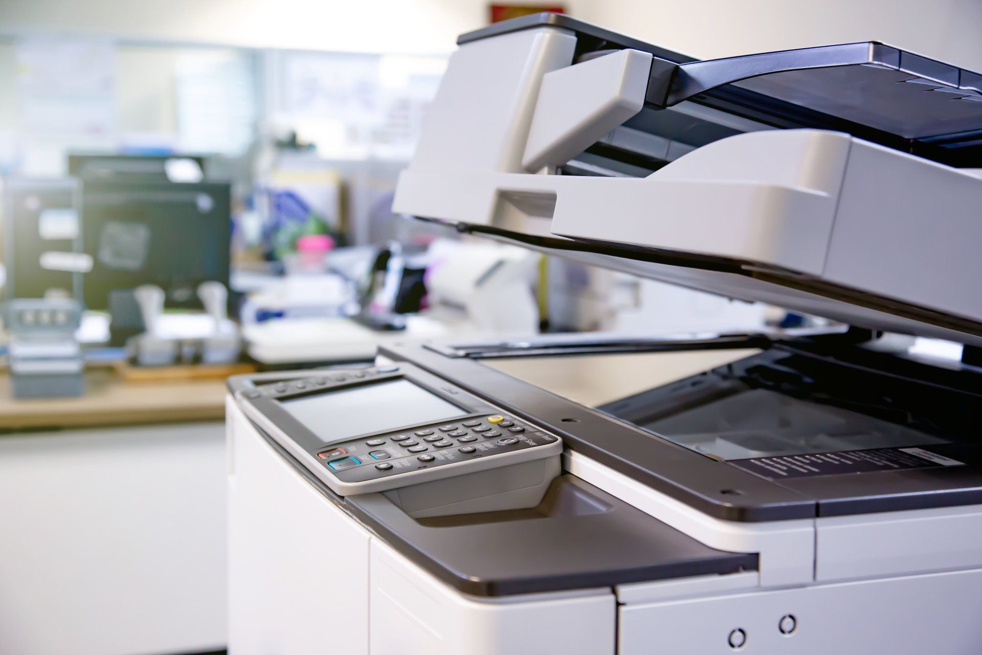 The photocopier or network printer is office worker tool equipment for scanning and copy paper