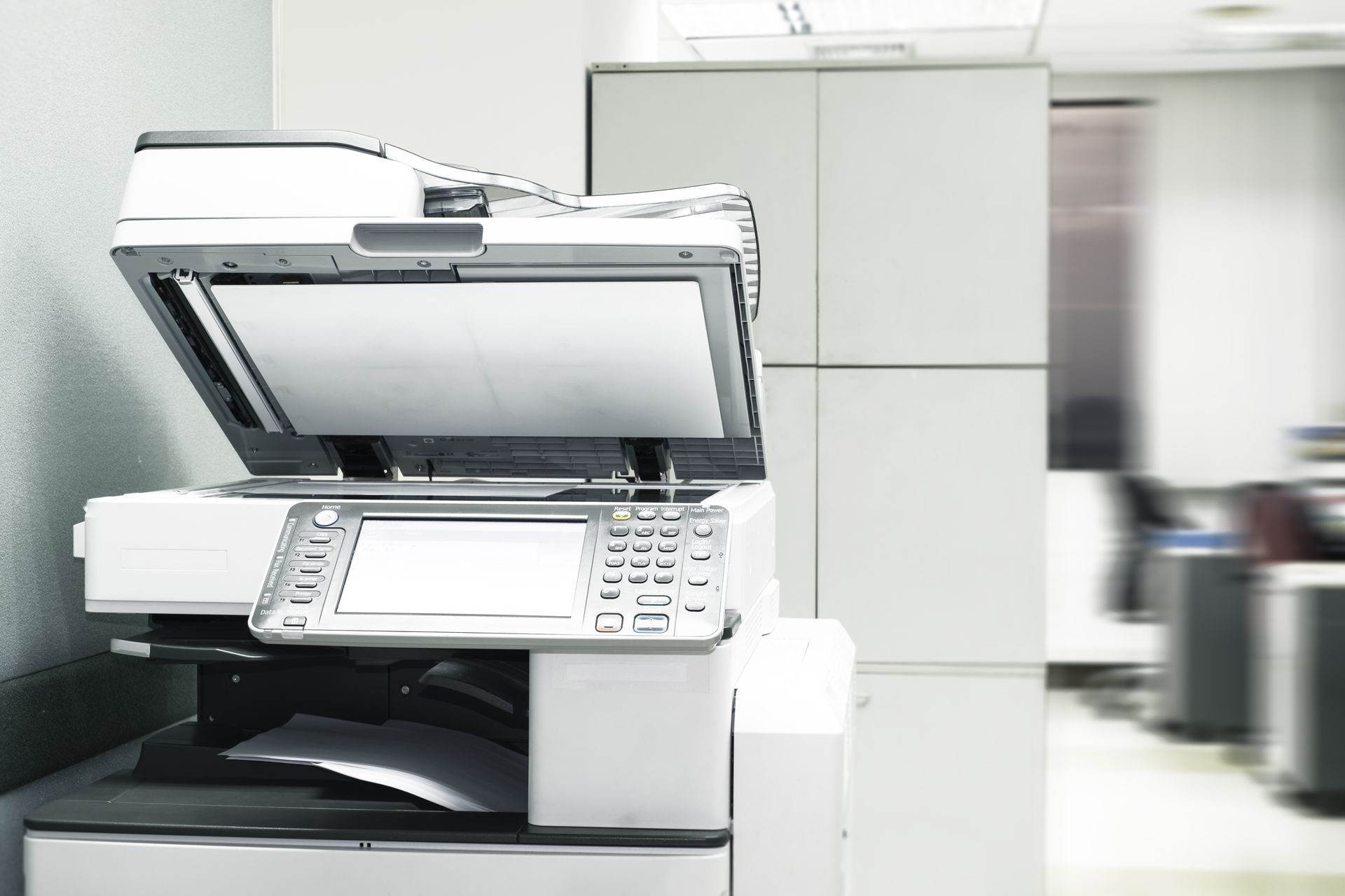 Bussiness man Hand press button on panel of printer, printer scanner laser office copy machine