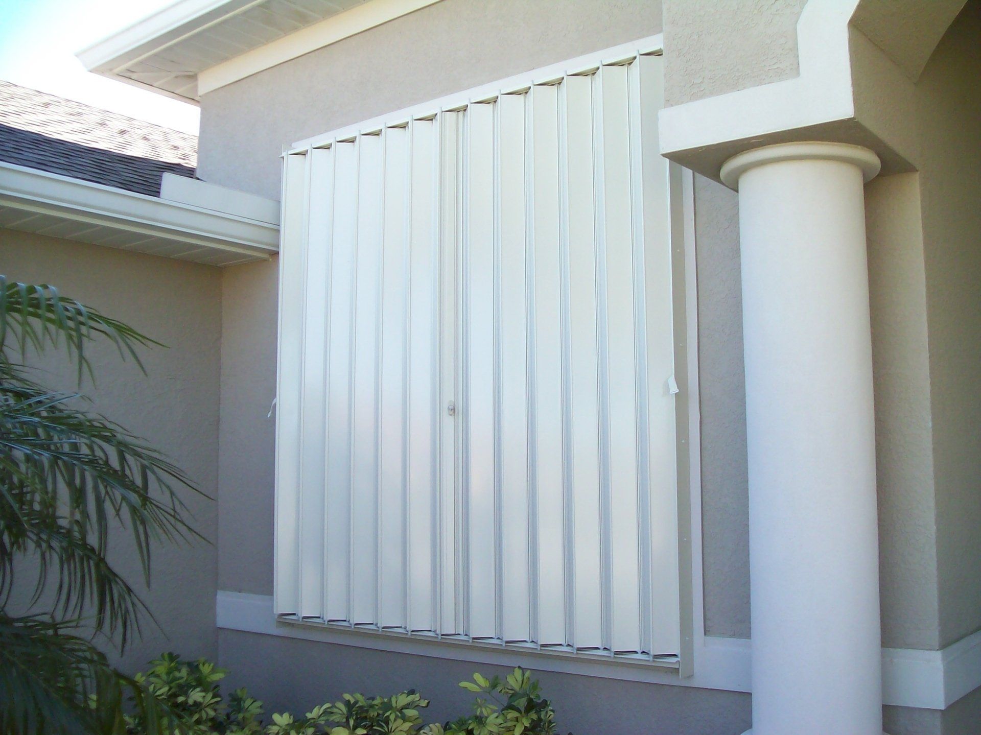Closed Shutter Of A Glass Window — Reliable Shutter Co., Inc. — Venice, Florida