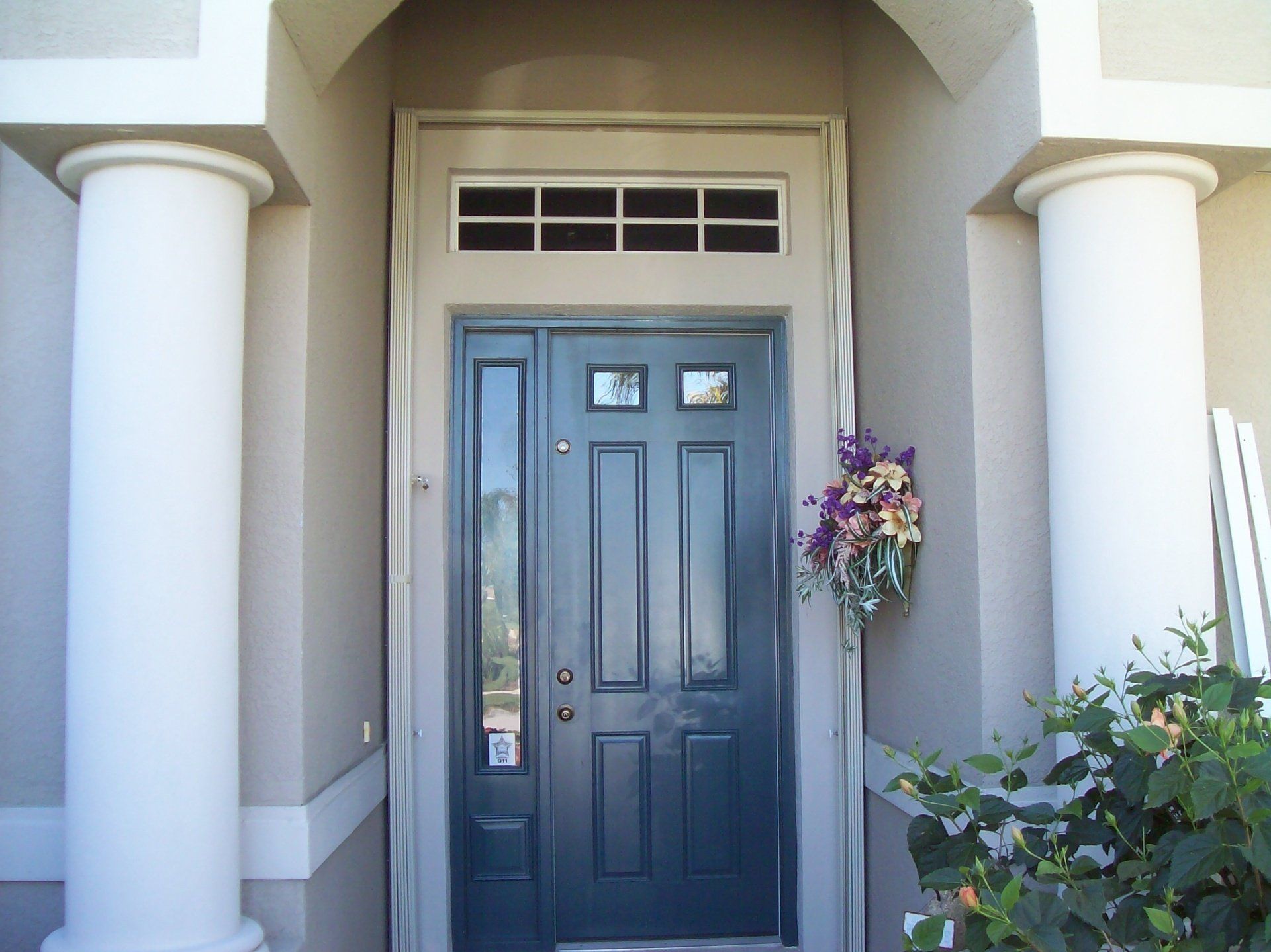 Blue Front Door — Reliable Shutter Co., Inc. — Venice, Florida